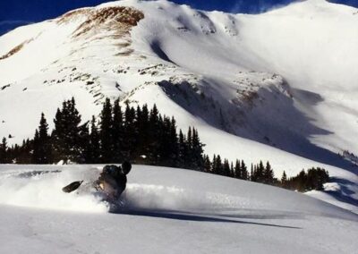 Snowmobiling in the Gunnison Basin. Photo Credit: Ben Breslauer