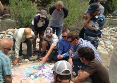 1 / 11 Senator Bennet met with community stakeholders at Erickson Springs in 2013 to discuss public lands in Gunnison County.